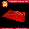 Commercial grade reflective sheeting for temporary warning signs